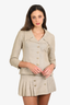Pre-Loved Chanel™ Vintage 90's Beige Linen Button Down Jacket with Pleated Skirt Set Size 38