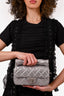 Pre-loved Chanel™ 2012 Silver Quilted Fabric Roll Reissue Clutch