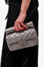 Pre-loved Chanel™ 2012 Silver Quilted Fabric Roll Reissue Clutch