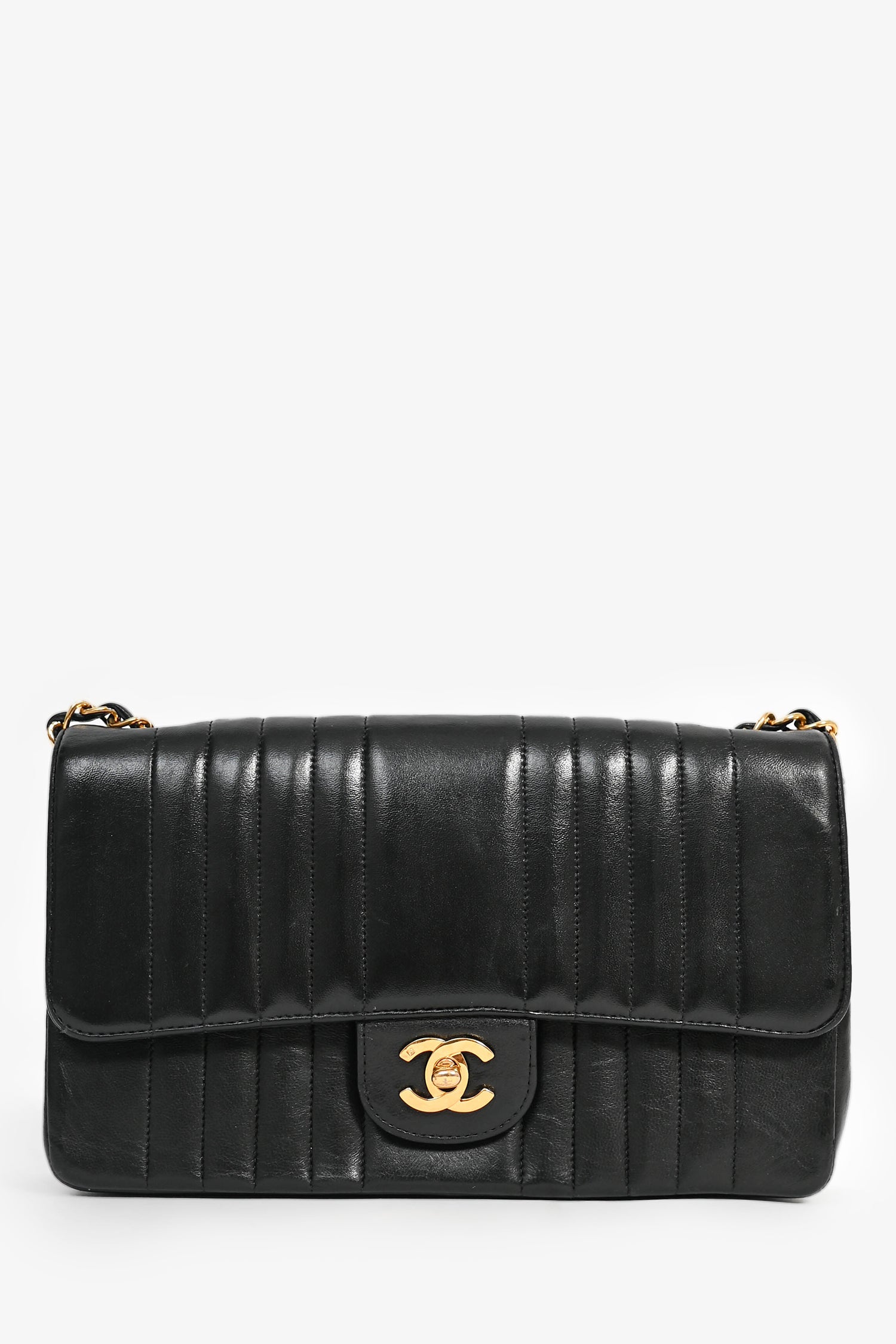 Pre-Loved Chanel™ 1991-94 Vintage Black Vertical Quilted Lambskin