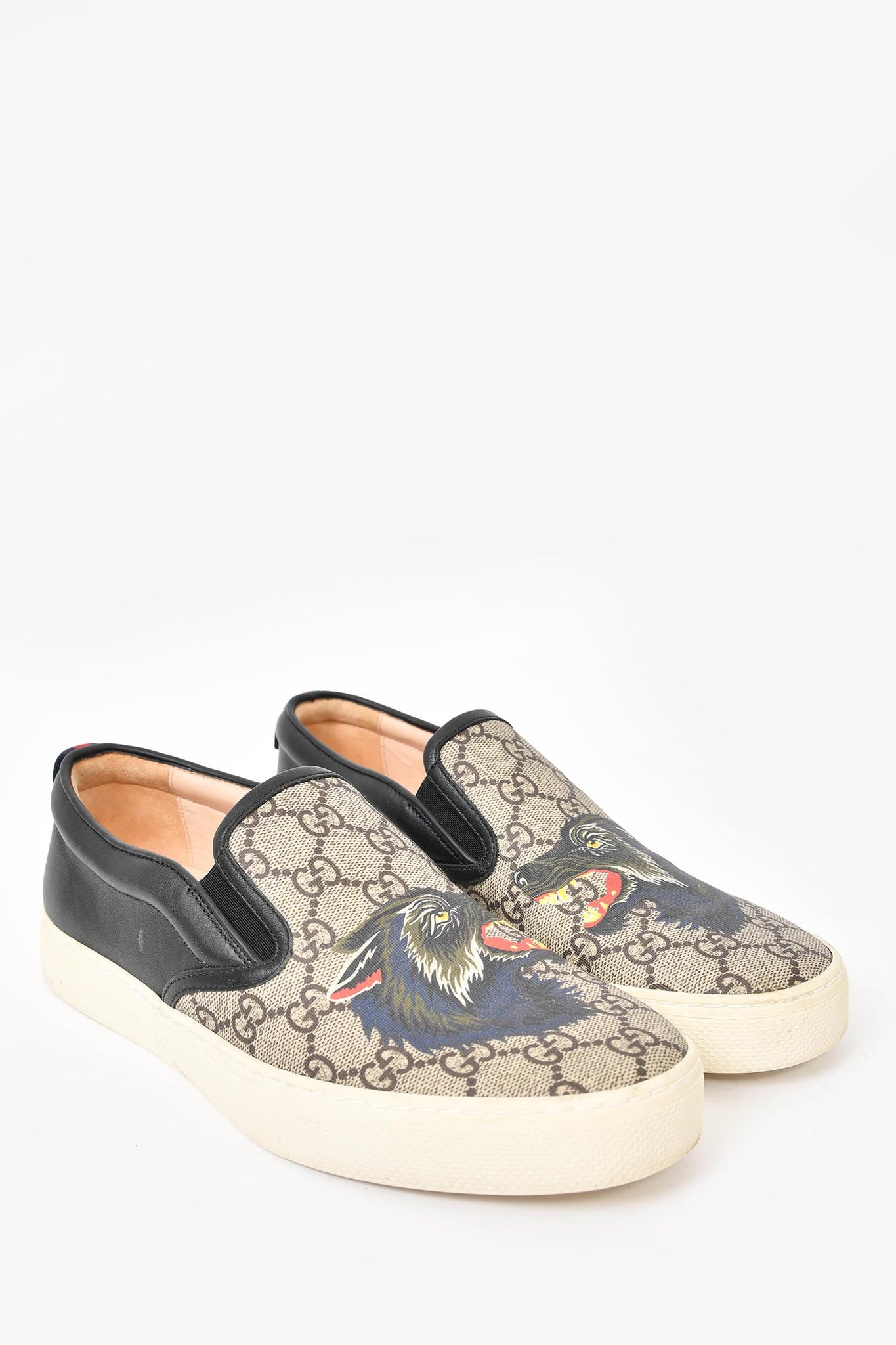 Shop the GG Supreme tiger slip-on sneaker by Gucci. A slip-on sneaker in GG  Supreme canvas with printe…