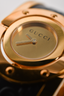 Gucci Gold Toned GG Leather Twirl Watch