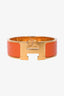 Hermes Gold Toned Orange Clic Clac Bracelet