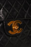 Pre-loved Chanel™ Black Lambskin Jumbo XL Maxi Flap