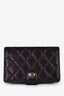 Pre-Loved Chanel™ 2013/14 Purple Shimmer Fabric Quilted Flap Wallet