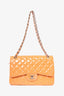 Pre-Loved Chanel™ 2011 Orange Patent Leather Jumbo Double Flap SHW