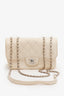 Pre-Loved Chanel™ Cream Lambskin Timeless Bag