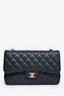 Pre-Loved Chanel™ 2019 Black Caviar Leather Jumbo Double Flap Should Bag