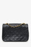 Pre-Loved Chanel™ 1986-88 Black Quilted Lambskin Circle CC Mini Flap Bag