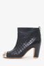 Pre-Loved Chanel™ Black Leather/Metal Cap Toe Quilted Ankle Boots Size 36.5