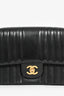 Pre-Loved Chanel™ 1991-94 Vintage Black Vertical Quilted Lambskin Medium CC Flap Bag