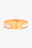 Hermès Gold Toned/Pink Enamel 'Charniere Uni' Narrow Hinged Bracelet