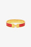Hermès Gold Tone Metal Red Enamel Clic H Bangle
