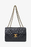 Pre-Loved Chanel™ 1994-1996 Black Lambskin 24K Gold Jumbo Maxi Single Flap Shoulder Bag