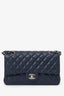 Pre-Loved Chanel™ 2013-14 Caviar Leather Medium Double Flap Bag