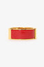 Hermès Red Enamel/Gold Toned Metal Clic Clac Bracelet
