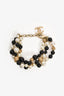 Pre-Loved Chanel™ Black/White/Gold Toned Faux Pearl Beaded CC Logo Triple Strand Bracelet
