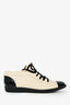 Pre-Loved Chanel™ Cream/Black Leather Interlocking CC Logo Sneakers Size 39