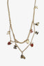 Pre-Loved Chanel™ 2010 Gold Toned Black/White/Red Enamel 'Coco Rider' Charm Chain Belt