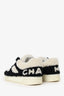 Pre-Loved Chanel™ Black/White Shearling Low Top Sneakers Size 37