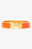 Hermès Gold-toned/Orange Enamel Clic Bracelet