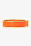 Hermès Gold-toned/Orange Enamel Clic Bracelet