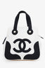 Pre-Loved Chanel™ 2003-04 Black/White Canvas Marshmallow CC Handle Bag