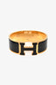 Hermès Gold Toned/Black Clic Clac Bracelet