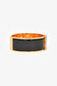 Hermès Gold Toned/Black Clic Clac Bracelet