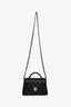 Pre-Loved Chanel™ 2025 Black Quilted Lambskin Mini Rectangular Top Handle Flap Bag
