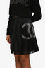 Pre-Loved Chanel™ 22A Black Pleated Pearl CC Mini Skirt Size 36
