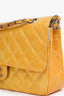 Pre-Loved Chanel™ 2000-2002 Yellow Patent Medium Double Flap Bag