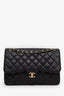 Pre-Loved Chanel™ 2013-14 Black Caviar Jumbo Classic Double Flap Bag