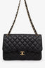 Pre-Loved Chanel™ 2013-14 Black Caviar Jumbo Classic Double Flap Bag