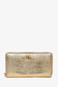 Gucci Gold Leather Embossed Long GG Zip Wallet