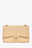 Pre-Loved Chanel™ 2011 Beige Caviar Leather Jumbo Double Flap Bag