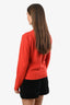 Pre-loved Chanel™ Orange Wool V-Neck Long Sleeve CC Sweater Estimated Size 36