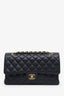 Pre-loved Chanel™ 2023 Black Quilted Caviar Medium Classic Double Flap
