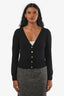 Cardigan Versace en laine noire à boutons Medusa, taille 38