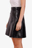 Jupe midi Louis Vuitton en cuir verni noir, taille 36