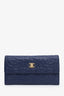 Pre-loved Chanel™ 2016 Navy Caviar Embossed Camellia Large Gusset Flap Wallet