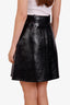 Jupe midi Louis Vuitton en cuir verni noir, taille 36