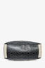 Sac de voyage Chanel en toile enduite noire et blanche avec camélias, collection 2017/18