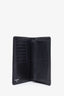 Pre-loved Chanel™ Black Patent Quilted Symbol of Charms Wallet