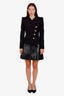 Jupe midi Louis Vuitton en cuir verni noir, taille 36