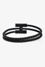 Bracelet jonc Hermès en cuir tressé noir et métal en forme de H « Tournis Tresse »