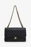 Pre-loved Chanel™ 2013-14 Black Caviar Jumbo Classic Double Flap Bag