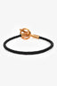 Bracelet Hermès « Glenan » en cuir noir à fermoir à boutonnage, GHW