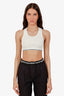 Pre-loved Chanel™ 18P Cream Ribbed Knit Embossed CC Cropped Tank Top Size 36
