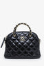 Pre-loved Chanel™ 24B Black Patent Quilted Shiny Coco Clutch with Chain